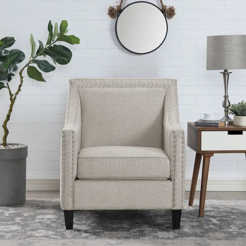 Fauteuil décontracté avec garniture cloutée chromée