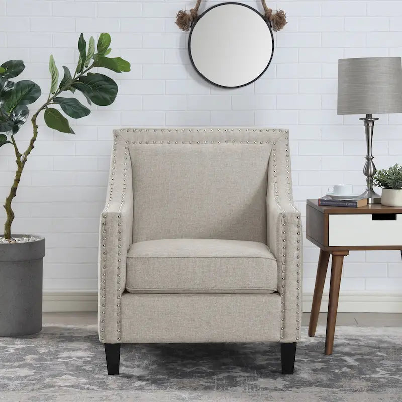 Fauteuil décontracté avec garniture cloutée chromée
