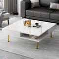 Table basse laquée : 4 pieds dorés, 2 tiroirs, design carré à 2 niveaux